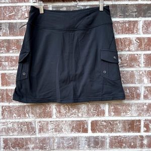 ATHLETA brand black stretch tennis skirt size S